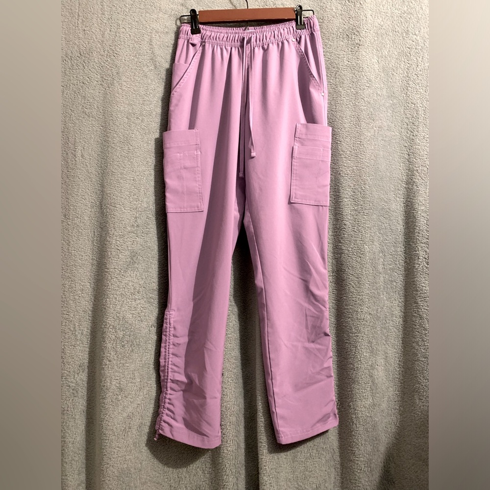 Easy Stretch women’s scrubs size XS petite color is dark lavender. Like new!